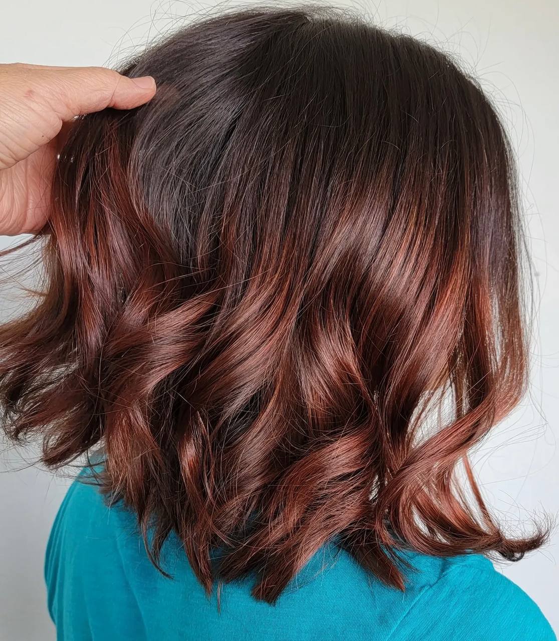 Dark hair with auburn waves by Ivy Pham